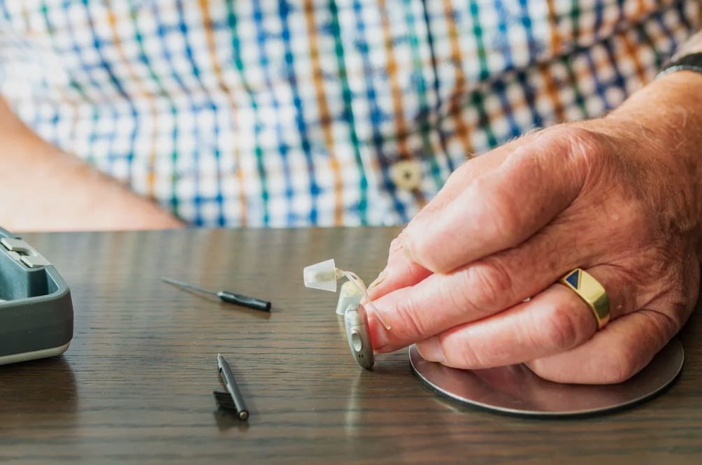 Cleaning Hearing Aid Care Guide by Hearing Aid Helper